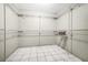 Spacious walk-in closet with multiple tiers of shelving for optimal storage solutions at 34651 Appaloosa Trl, Zephyrhills, FL 33541