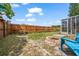 Backyard featuring a fire pit, patio, landscaping, and a privacy fence at 4209 Stratfield Dr, New Port Richey, FL 34652