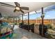 View of covered patio featuring outdoor furniture, a grill, and a fenced yard at 4209 Stratfield Dr, New Port Richey, FL 34652