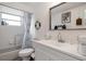 Bathroom featuring a shower and vanity with sink at 4209 Stratfield Dr, New Port Richey, FL 34652