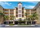 Stylish condominium building boasting a grand entrance and multiple balconies for serene outdoor living at 425 150Th Ave # 2501, Madeira Beach, FL 33708