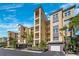 Stunning condominium building featuring private balconies and attached garages for convenient parking at 425 150Th Ave # 2501, Madeira Beach, FL 33708