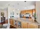 Modern kitchen featuring granite countertops, stainless steel appliances, and elegant pendant lighting at 425 150Th Ave # 2501, Madeira Beach, FL 33708