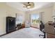 Home office features a ceiling fan, desk, and a large window providing natural light at 425 150Th Ave # 2501, Madeira Beach, FL 33708