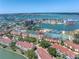 Aerial view of the community highlighting the property's location near the water and tennis courts at 472 Sandy Hook Rd, Treasure Island, FL 33706