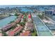 Aerial view of the community highlighting the property's proximity to the tennis courts and marina at 472 Sandy Hook Rd, Treasure Island, FL 33706