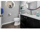 Cozy bathroom with modern sink, vanity, and a beautiful mirror at 472 Sandy Hook Rd, Treasure Island, FL 33706