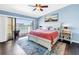 Spacious main bedroom with balcony access and waterfront views at 472 Sandy Hook Rd, Treasure Island, FL 33706