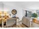 Home office featuring a desk, comfortable seating, and view of the water at 472 Sandy Hook Rd, Treasure Island, FL 33706