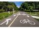 Paved bike path with pedestrian lane, providing safe and convenient access for outdoor activities at 508 N Mayo St, Crystal Beach, FL 34681