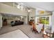 Open floor plan featuring the living room, dining room and a brick fireplace at 508 N Mayo St, Crystal Beach, FL 34681