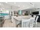 This spacious open-concept kitchen features ample island seating and modern stainless steel appliances at 5200 Brittany S Dr # 1502, St Petersburg, FL 33715