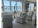 Living room features water view with comfortable seating and unique decor at 5200 Brittany S Dr # 1502, St Petersburg, FL 33715