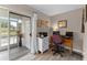 Bright home office space with a view of the outdoors and functional furniture at 5503 67Th N Ave # 18, Pinellas Park, FL 33781