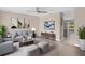 Comfortable living room showcasing modern furniture, stylish decor, and wood-look flooring at 5503 67Th N Ave # 18, Pinellas Park, FL 33781