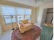 Bright and airy living space with water views, featuring a comfortable sofa and stylish decor, perfect for relaxation at 5935 30Th S Ave # 308, Gulfport, FL 33707