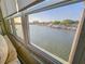 Lovely screened windows offer a picturesque view of the channel and boat docks at 5935 30Th S Ave # 308, Gulfport, FL 33707
