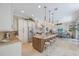 Open kitchen featuring granite countertops and stainless steel appliances at 597 Bay St, Palm Harbor, FL 34683