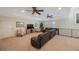 Upstairs living area with comfortable seating and modern ceiling fans at 597 Bay St, Palm Harbor, FL 34683