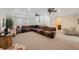 Large living room with comfortable seating, recessed lighting, and ceiling fans for a relaxing ambiance at 597 Bay St, Palm Harbor, FL 34683