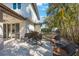 Paver patio with furniture and partial lawn at 597 Bay St, Palm Harbor, FL 34683