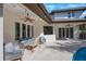 Outdoor patio with comfortable seating and view of pool at 597 Bay St, Palm Harbor, FL 34683