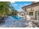Backyard swimming pool and patio seating at 597 Bay St, Palm Harbor, FL 34683