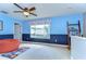 Spacious bedroom with a ceiling fan, large window, and stylish decor is great for  at 6112 Ibispark Dr, Lithia, FL 33547