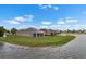 Exterior view showcasing several homes next to a body of water at 626 15Th Nw Ave, Ruskin, FL 33570