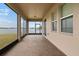 Covered and screened lanai overlooking a tranquil lake at 626 15Th Nw Ave, Ruskin, FL 33570