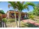 Beautiful home featuring stone accents, complemented by lush landscaping and a welcoming entrance at 630 48Th N Ave, St Petersburg, FL 33703