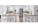 Spacious kitchen with stainless steel refrigerator and ample counter space at 630 48Th N Ave, St Petersburg, FL 33703