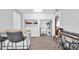 Bright laundry room featuring a washer, dryer, water heater, utility sink, and built in storage at 630 48Th N Ave, St Petersburg, FL 33703