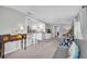 Open-concept living space with bar seating and views to kitchen at 630 48Th N Ave, St Petersburg, FL 33703