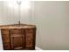 Cozy powder room with corner vanity and decorative tiled countertop and sink at 6515 Dimarco Rd, Tampa, FL 33634