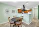 Dining area featuring tile floors, natural lighting, and neutral paint at 6515 Dimarco Rd, Tampa, FL 33634