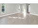 Bedroom with neutral paint, tile floors, and natural light at 6994 Country Lakes Cir, Sarasota, FL 34243