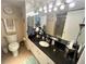 Modern bathroom with stylish mirror, fixtures, and vanity, providing a luxurious feel at 880 Mandalay Ave # S511, Clearwater Beach, FL 33767