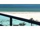 Balcony view of the sandy beach and tranquil ocean waters from a beautiful residence at 880 Mandalay Ave # S511, Clearwater Beach, FL 33767