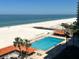 Aerial view of a pool and beach at 880 Mandalay Ave # S511, Clearwater Beach, FL 33767