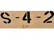 A close up of a sign reading S-4-2, possibly a unit number, with a simple, industrial design at 880 Mandalay Ave # S511, Clearwater Beach, FL 33767