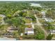 Aerial view of the home showcasing the backyard, shed, and neighborhood at 8805 Van Fleet Rd, Riverview, FL 33578