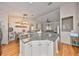 Spacious kitchen featuring eat-in bar, stainless steel appliances, and open floor plan to the living area at 8805 Van Fleet Rd, Riverview, FL 33578