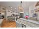 Inviting dining area, complete with stainless steel appliances and a charming, rustic table setting at 8805 Van Fleet Rd, Riverview, FL 33578