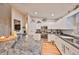Open kitchen design featuring stainless steel appliances, and eat-in breakfast bar, and ample storage at 8805 Van Fleet Rd, Riverview, FL 33578