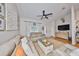 Comfortable living room featuring vaulted ceiling and stylish furnishings at 8805 Van Fleet Rd, Riverview, FL 33578