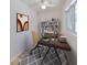 Cozy home office with natural light and shelving for a productive workspace at 940 Woodland Dr, Palm Harbor, FL 34683