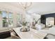 Open dining and living area, showcasing abundant natural light and a modern design at 10011 Parley Dr, Tampa, FL 33626