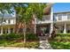 Charming home with a brick facade, lush landscaping, and a cozy porch area perfect for relaxing at 10011 Parley Dr, Tampa, FL 33626