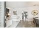 Bright living room with modern decor, featuring hardwood floors and stylish furnishings at 10011 Parley Dr, Tampa, FL 33626